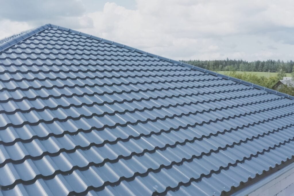 Modern roof made of metal. Corrugated metal roof and metal roofing.